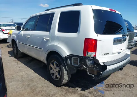 2011 Honda Pilot Touring из США, поврежденный, VIN 5FNYF4H92BB022128